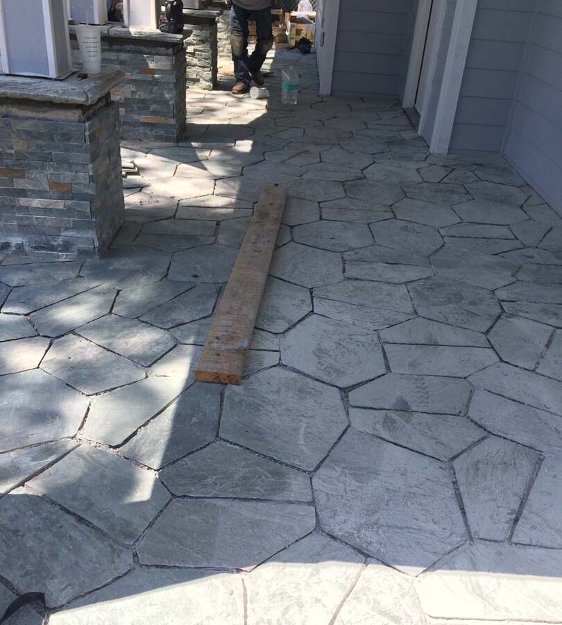 Construction of beautiful flagstone work. Each piece was hand cut and fixed in place; it will last a lifetime. Pacificland Constructors