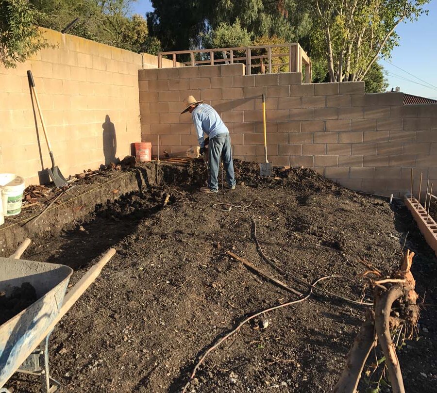 Excavation of dirt where pavers are going to be installed. Pacificland Constructors